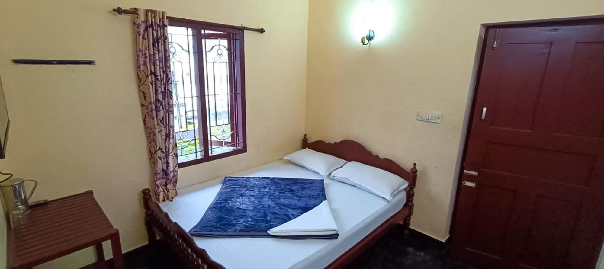 Swarna Tourist Home Munnar Εξωτερικό φωτογραφία