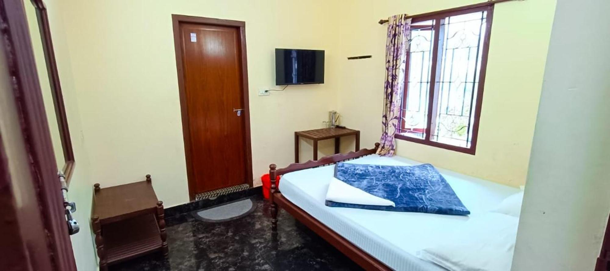 Swarna Tourist Home Munnar Εξωτερικό φωτογραφία